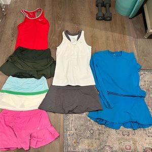 Tennis clothes, 2 full outfits, 1 top, 3 skirts.
